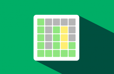 wordle游戏网格与黑色、黄色和绿色的盒子,在绿色背景。gydF4y2Ba